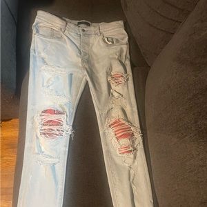 Amiri's with red patches. Brand new selling because I bought the wrong size